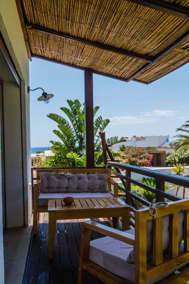 Chambre Mtariss – terrasse avec vue sur le jardin et la mer, Villa Bella Lina